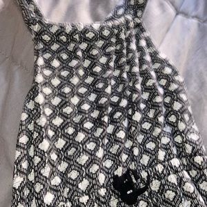 This is a black and white spaghetti strap dress